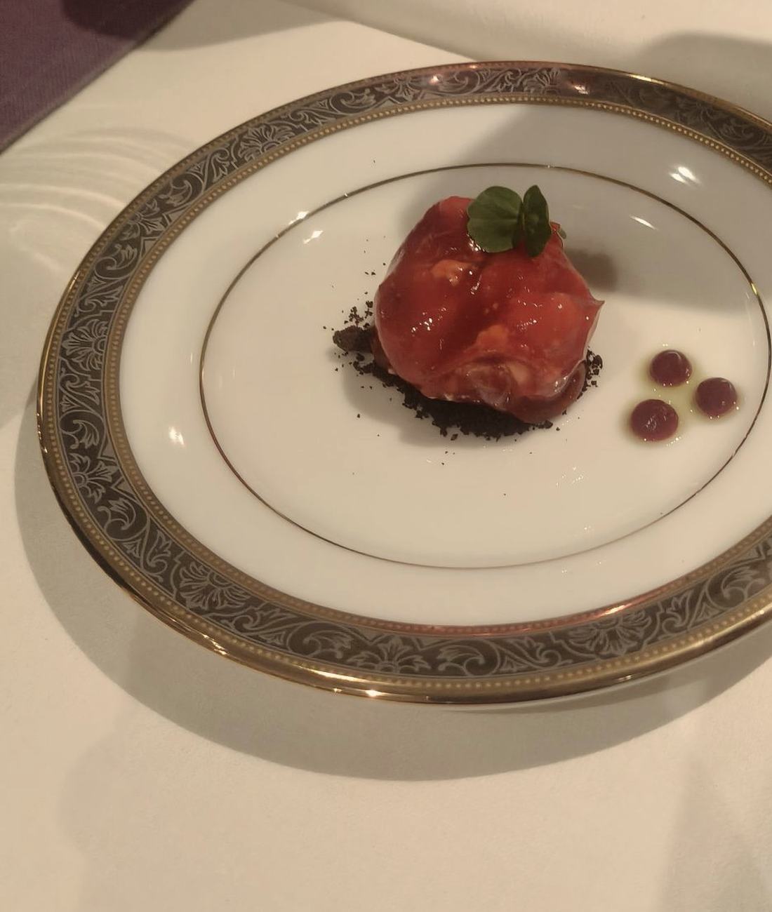 First light: cured tuna · heirloom tomato · black olive soil