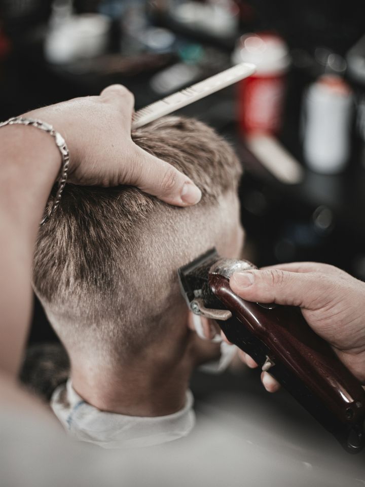 A clipper fade on grey hair