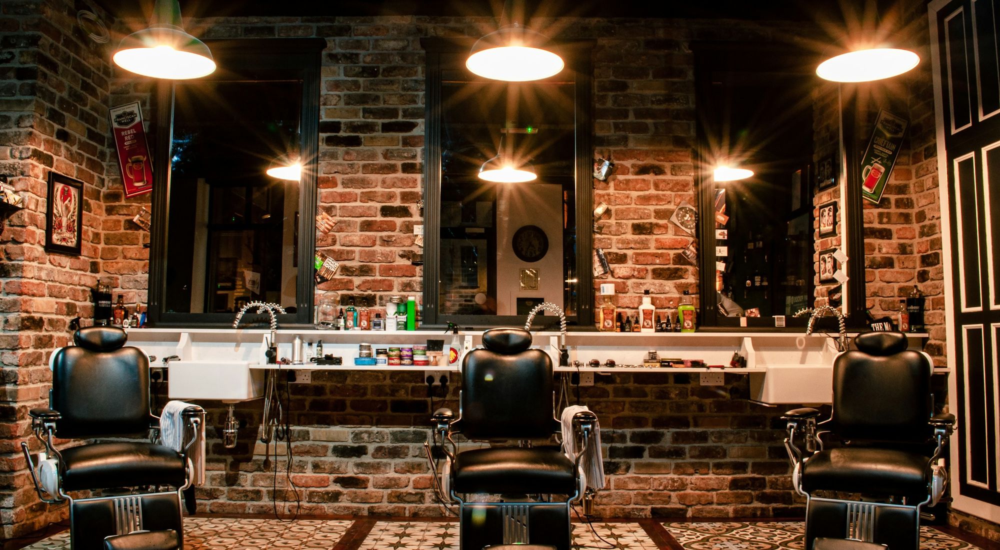 Inside the shop: chairs, mirrors and warm light