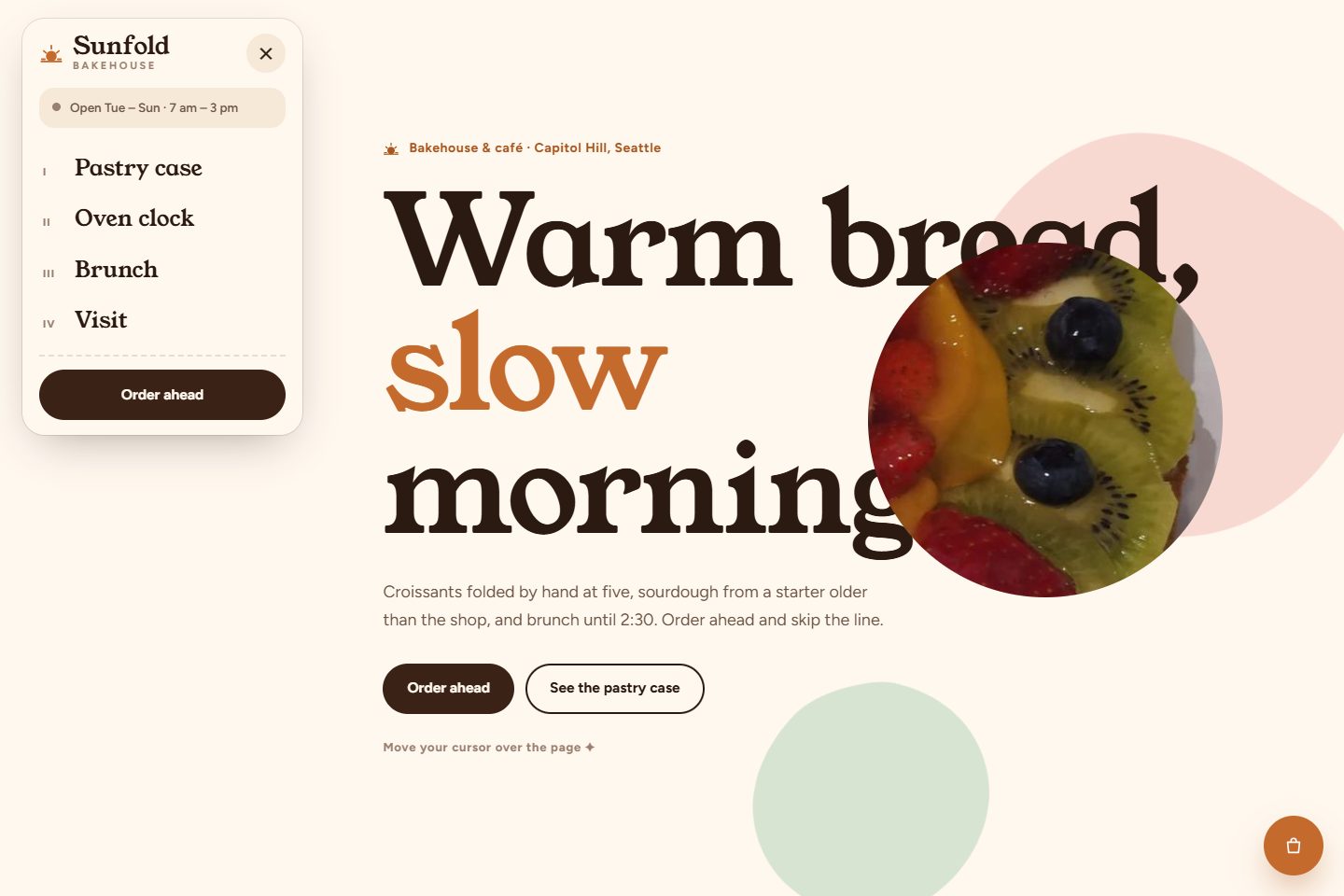 Sunfold Bakehouse website template: a soft, rounded café design with a cursor that reveals pastry photos