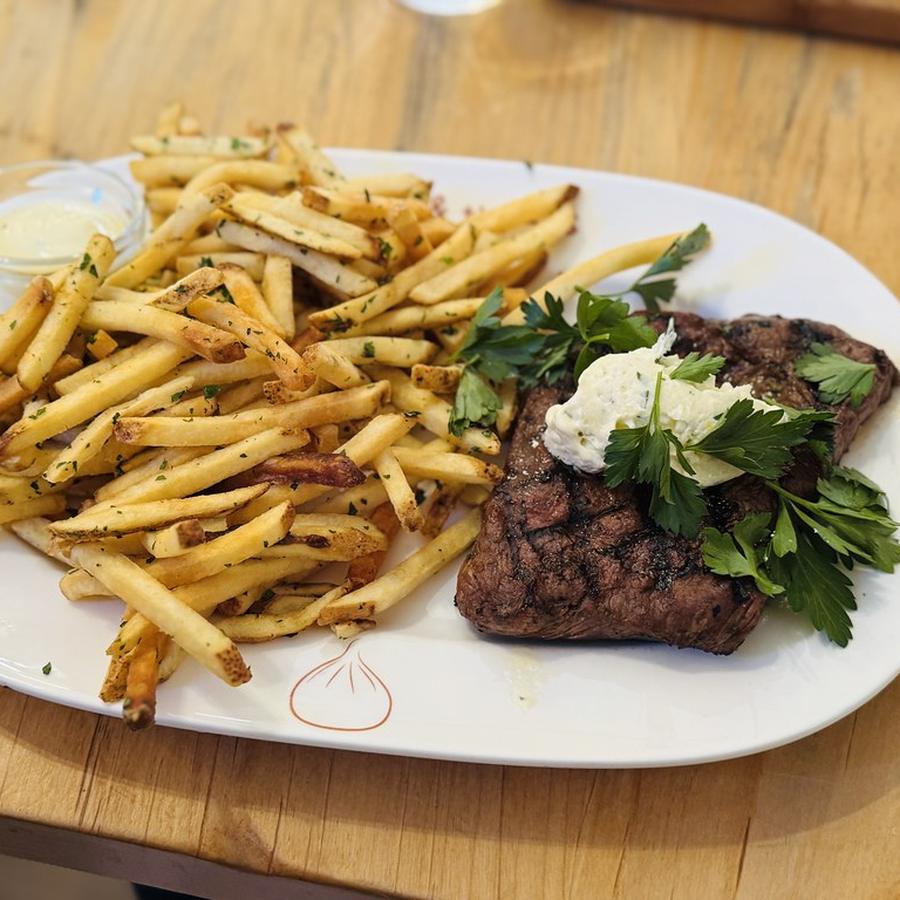 Steak frites, sauce au poivre at Maison Corbel